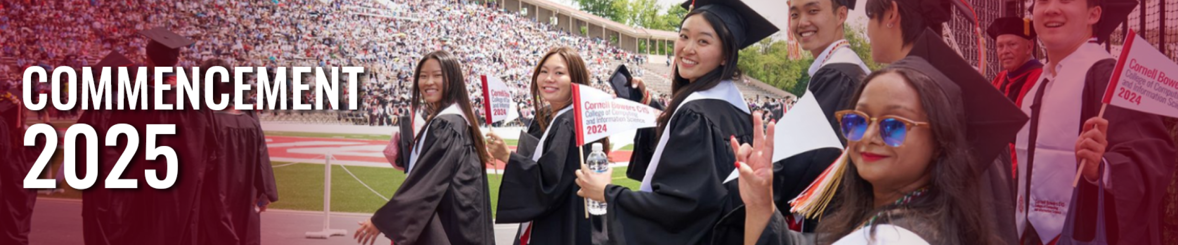 A color photo of students about to graduate with the text "Commencement 2025"