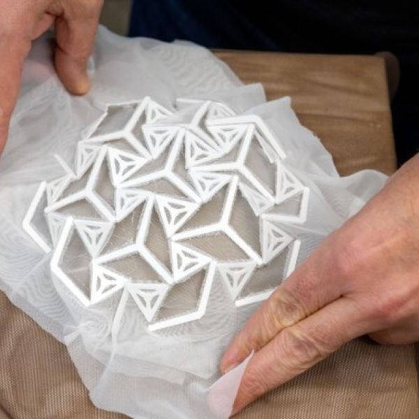 Ryan Young/Cornell University HelioSkin is a lightweight, stretchable architectural fabric that is aesthetically attractive and can wrap around complex shapes.