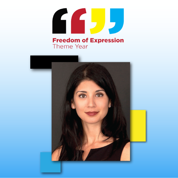 A color photo of a woman smiling for a photo with the text "Freedom of Expression Theme Year"