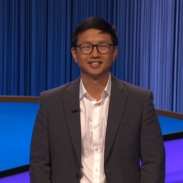 Man smiling at the camera on set of Jeopardy