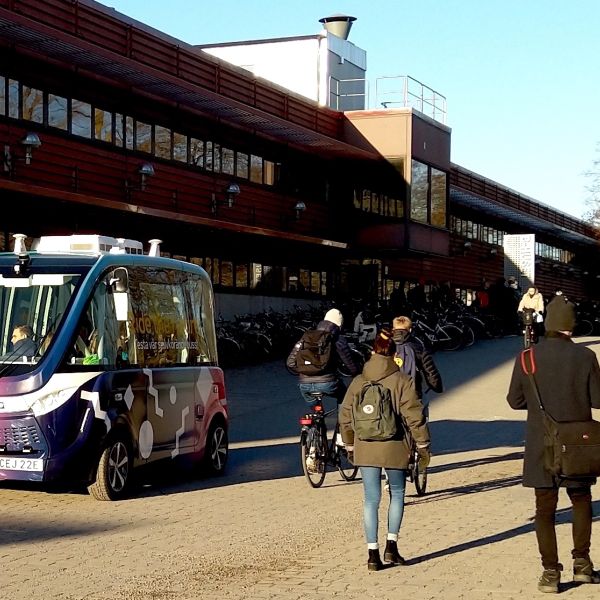 A color photo of an autonomous bus Caption: Autonomous buses in Linköping in Sweden must make frequent stops when pedestrians and cyclists get too close. Credit: Provided