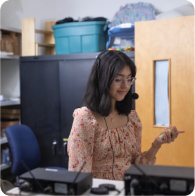 A color photo of a woman working on research