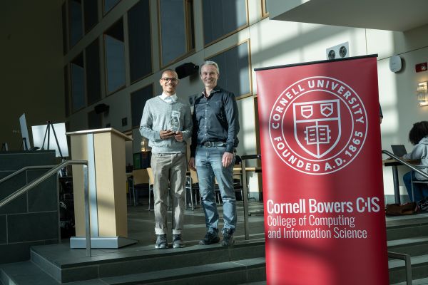 A color photo showing the BOOM Award winner(s) and presenters of the award.