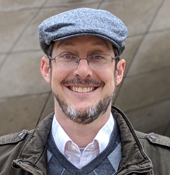 David Bindel A color photo of a man smiling for a photo