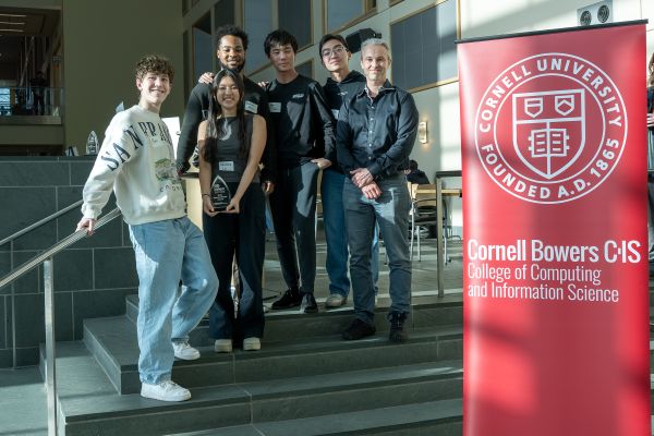 A color photo showing the Faculty Choice Award winner(s) and presenters of the award.