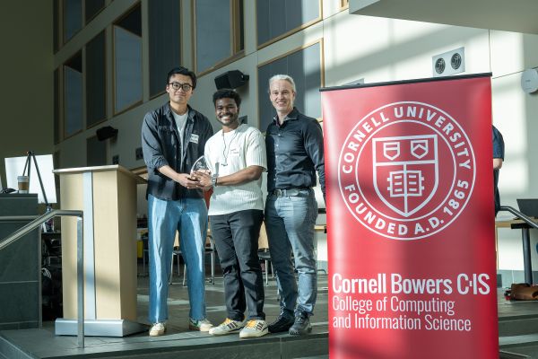A color photo showing the Faculty Choice Award winner(s) and presenters of the award.