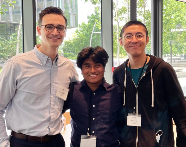 Sunil Sabnis (center) presented his paper written with co-authors René Kizilcec (left), and Renzhe Yu (right) at the 2022 Learning at Scale conference. Credit: Provided three men standing in group looking at camera