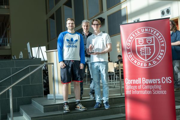 A color photo showing the Faculty Choice Award winner(s) and presenters of the award.