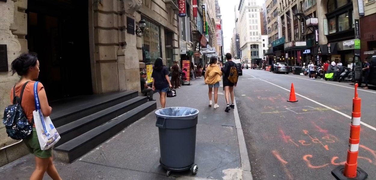 Trashbot in the wild A color photo showing "trashbot" navigating NYC