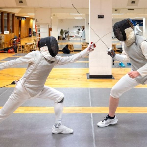 Students from the Men's Fencing Club, which clinched a surprise win at the U.S. Association of Collegiate Fencing Clubs championships, spar at a practice