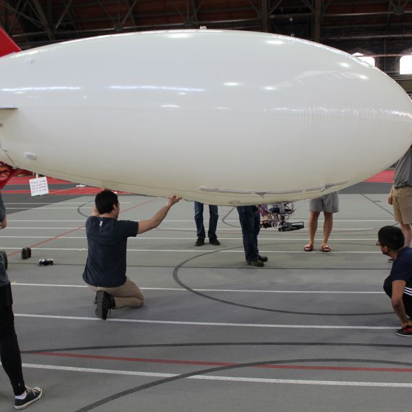 Student working on inflating the autonomous airship