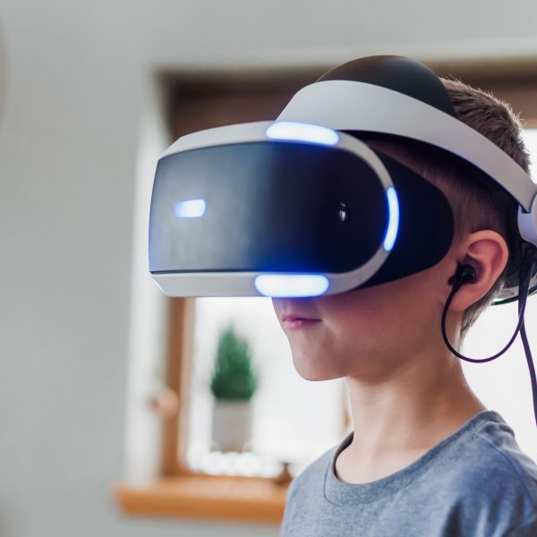 Child with virtual reality headset on